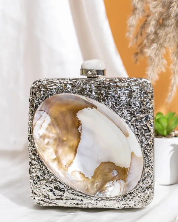 Kaia_Raw_Shell_Metal_Clutch